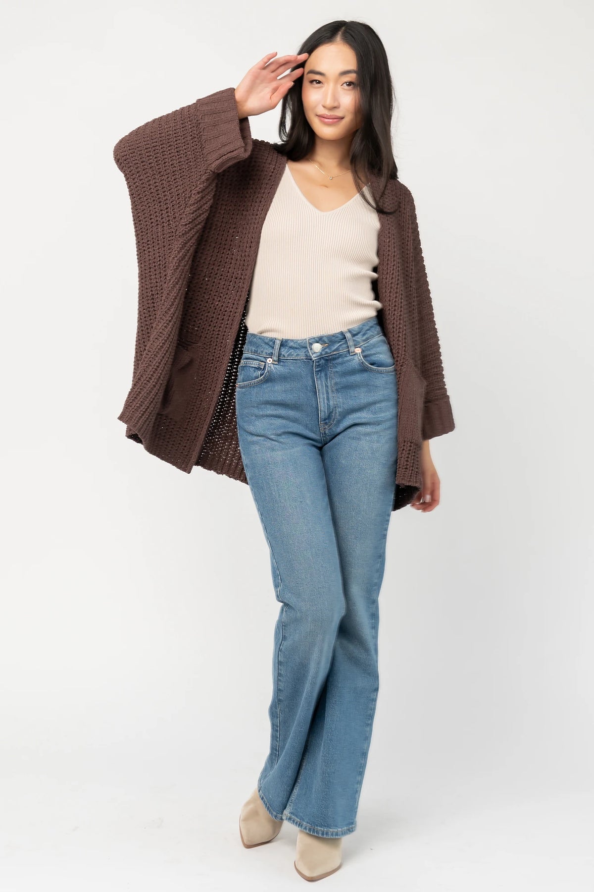 Cybele Oversized Cardigan in Dark Brown with soft chenille knit, open front, batwing sleeves, and patch pockets.