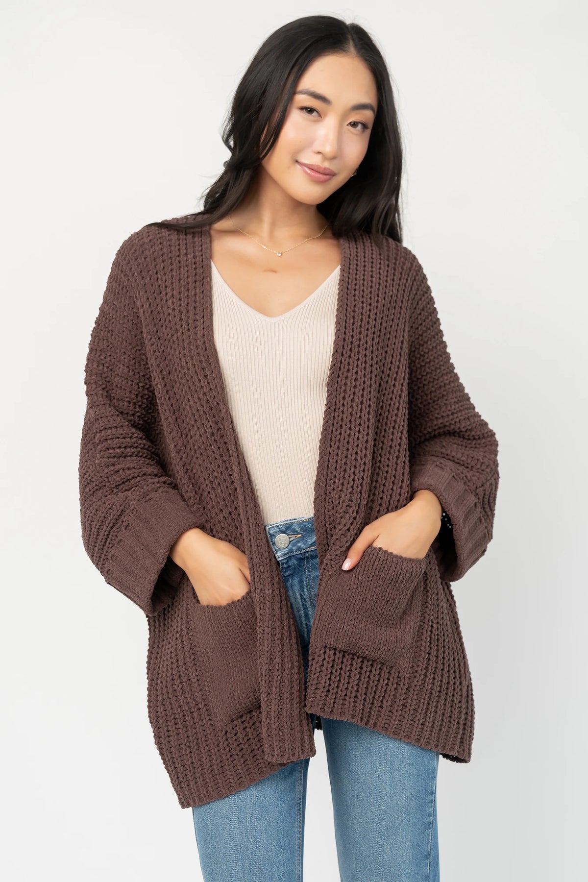 Cybele Oversized Cardigan in Dark Brown with soft chenille knit, open front, batwing sleeves, and patch pockets.