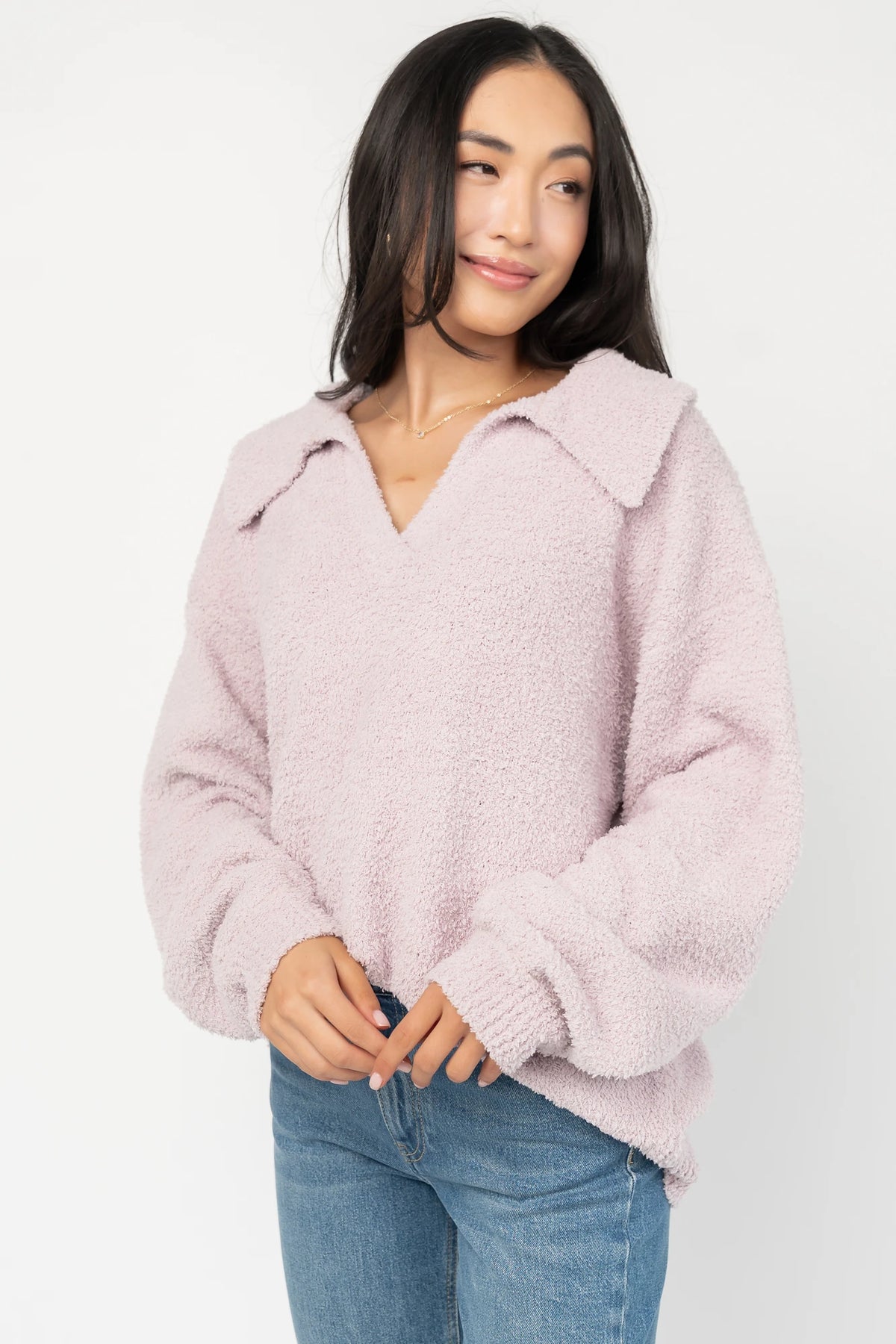 Lockwood Sweater in Dusty Lilac with fuzzy knit texture, collared V-neck, long sleeves, and ribbed cuffs and hem.