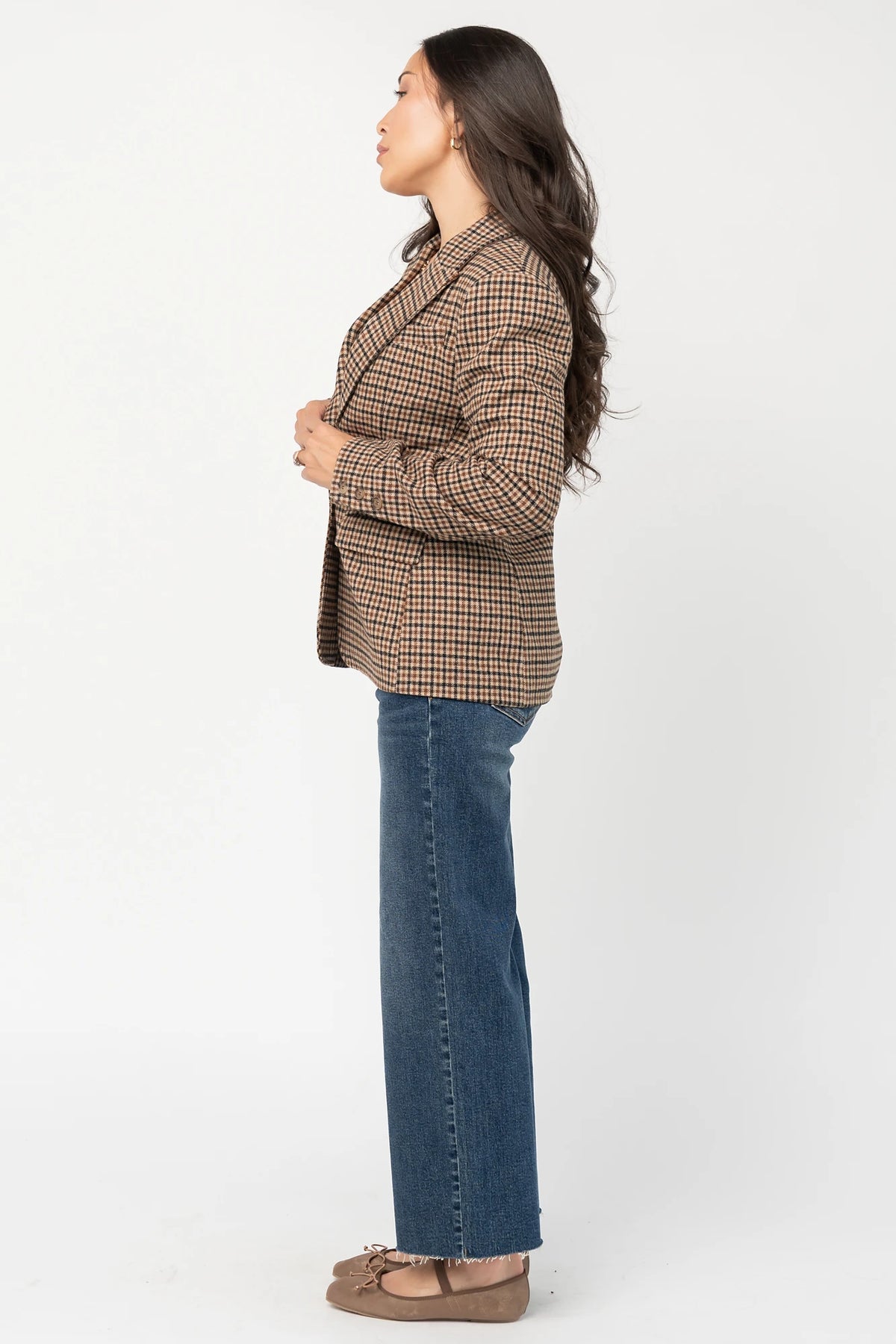 Damien Plaid Blazer in black and camel plaid with tailored waist, two-button front, flap pockets, and long sleeves.