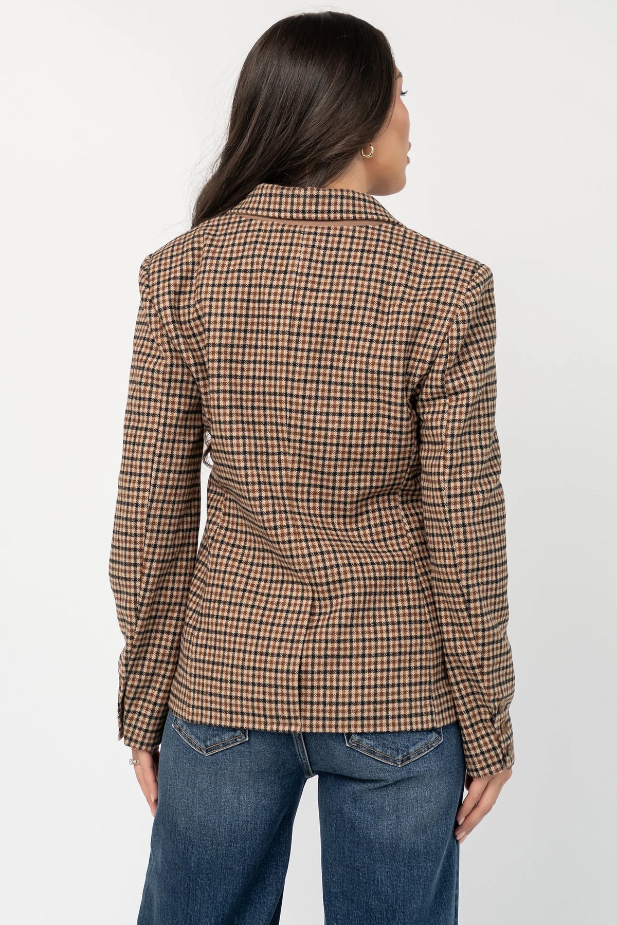 Damien Plaid Blazer in black and camel plaid with tailored waist, two-button front, flap pockets, and long sleeves.