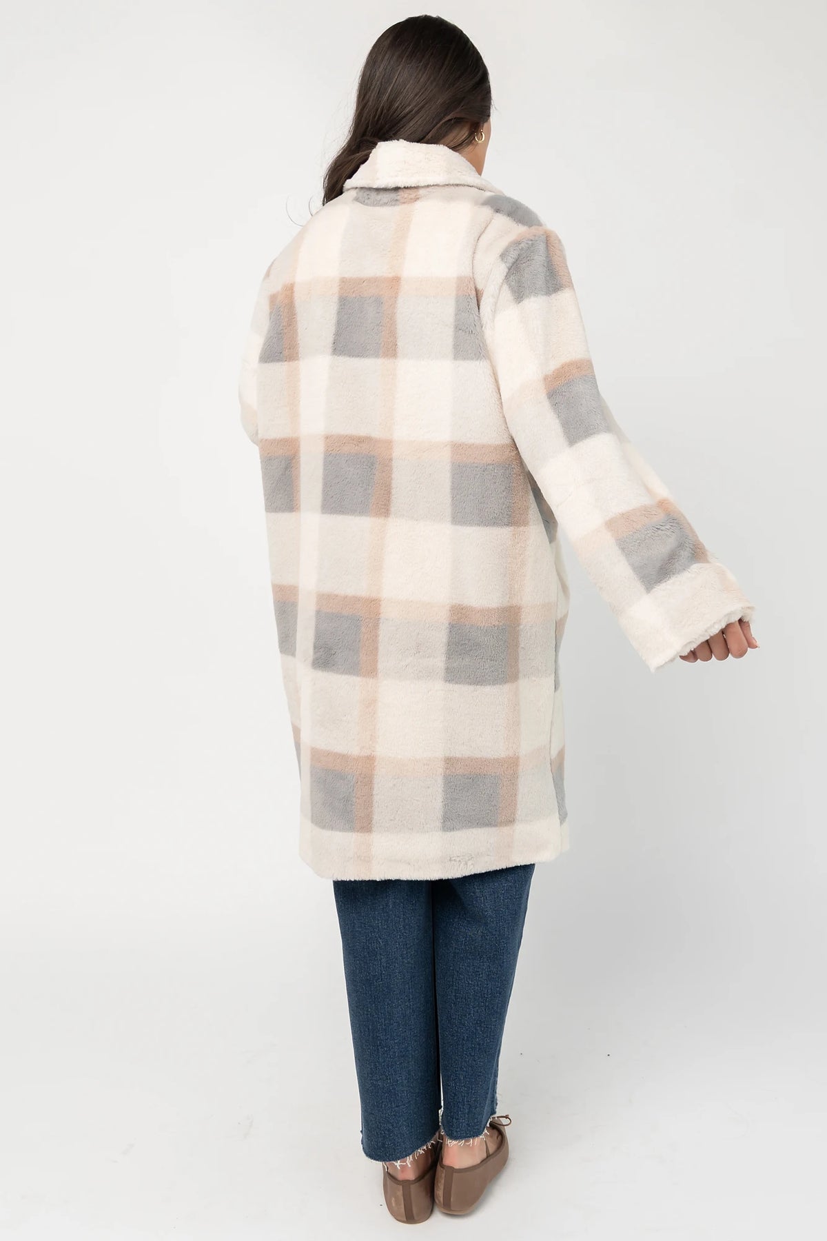 Natural plaid faux fur mid-length coat with taupe and gray accents, notched collar, hidden front snap closure, long sleeves, functional side pockets, and a fully lined interior.
