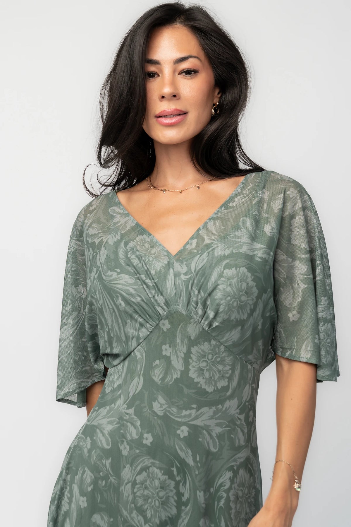 Dark sage mesh maxi dress with a floral mesh overlay, V-neckline, short dolman sleeves, empire waist, and removable ribbed tank slip.