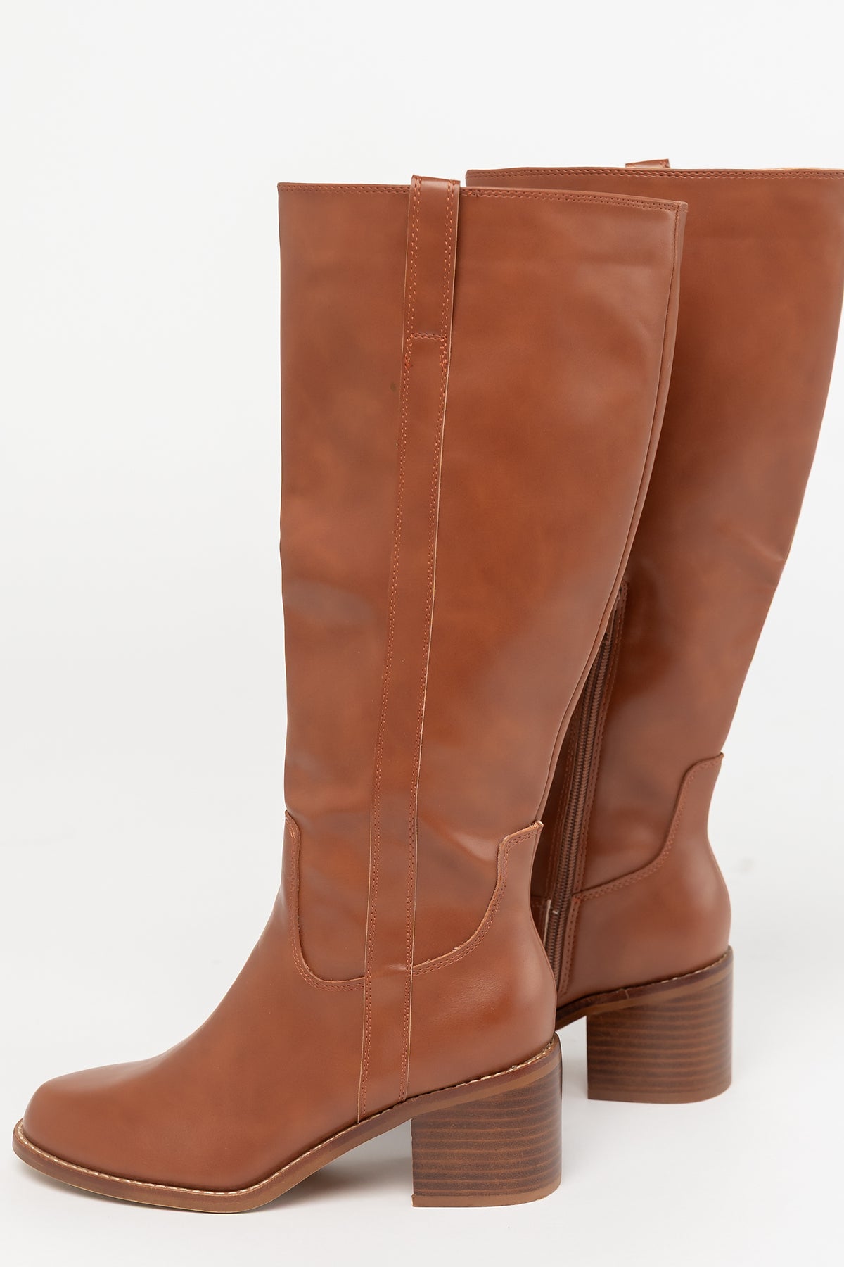 Collins Tall Riding Boots in Brown with smooth faux leather, rounded toe, stacked block heel, and pull-on tabs.