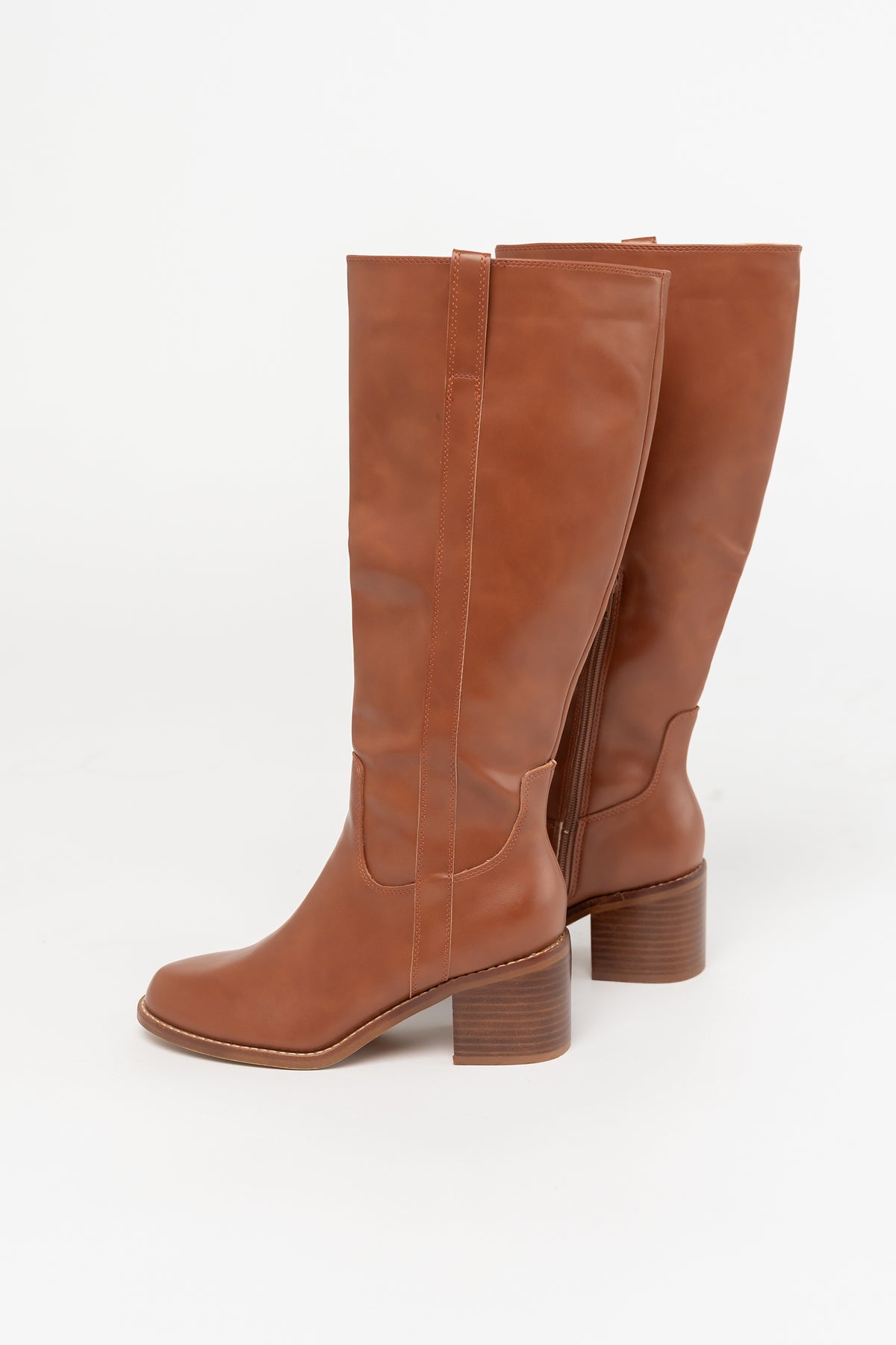 Collins Tall Riding Boots in Brown with smooth faux leather, rounded toe, stacked block heel, and pull-on tabs.