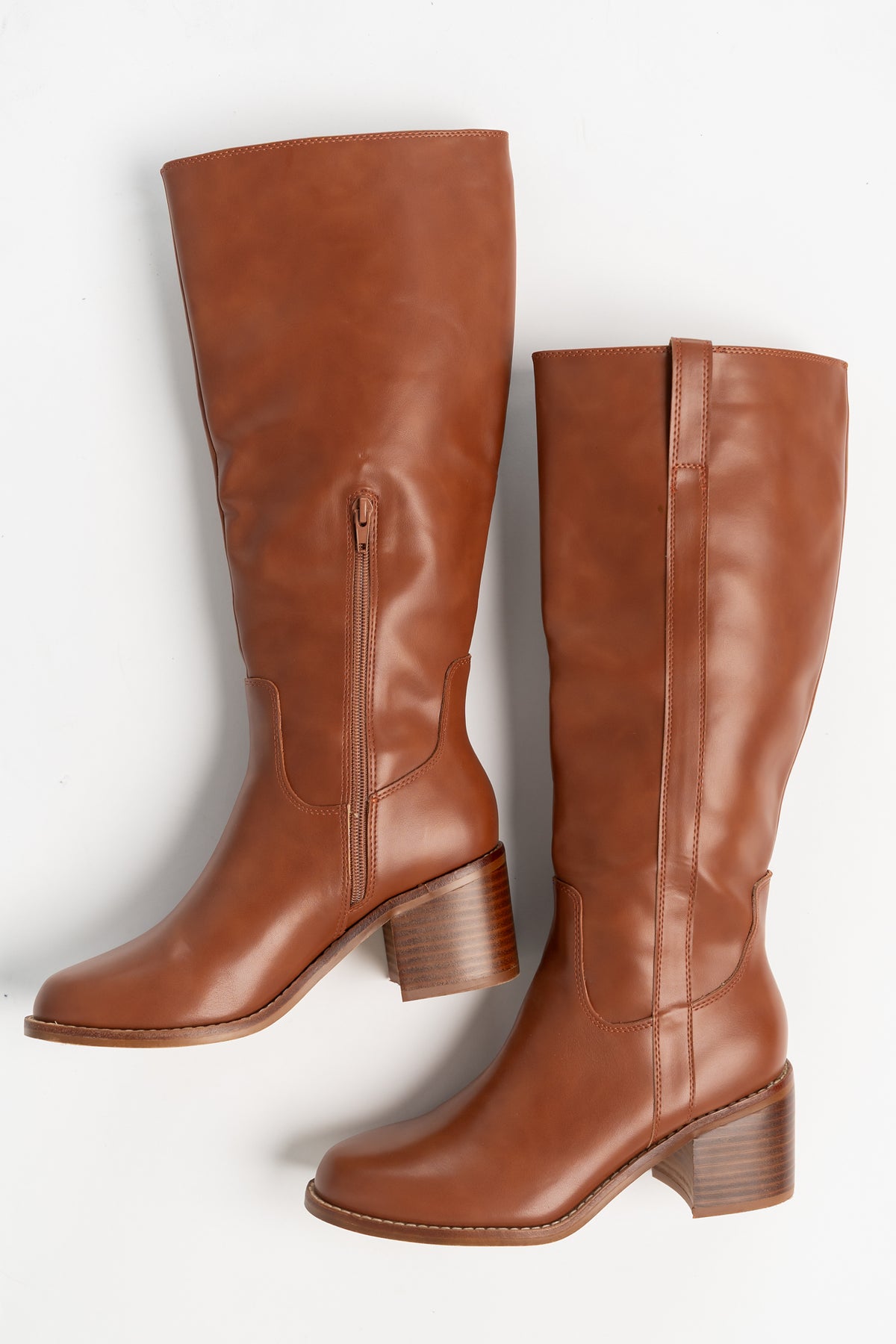 Collins Tall Riding Boots in Brown with smooth faux leather, rounded toe, stacked block heel, and pull-on tabs.