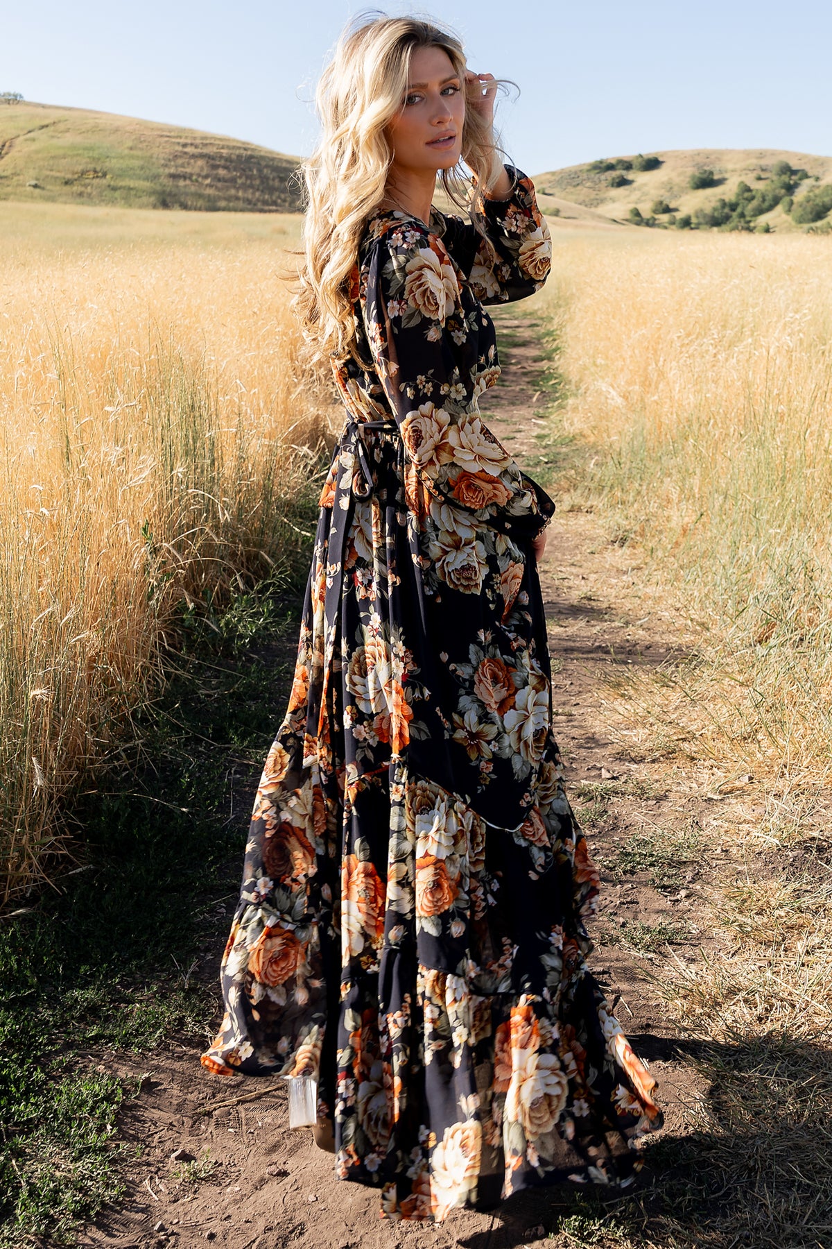 Close-up of the waist detail on the Johanna dress showing attached side ties, elasticized back and soft chiffon texture.