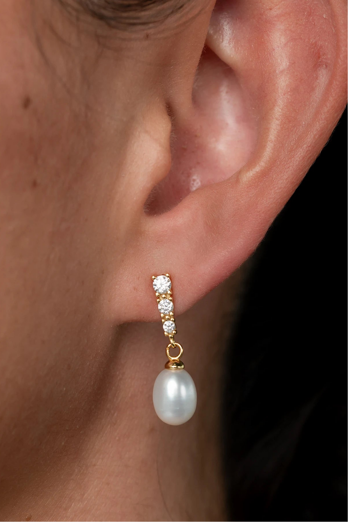 Romona Freshwater Pearl Earrings with luminous pearls and gold-finished sterling silver settings.