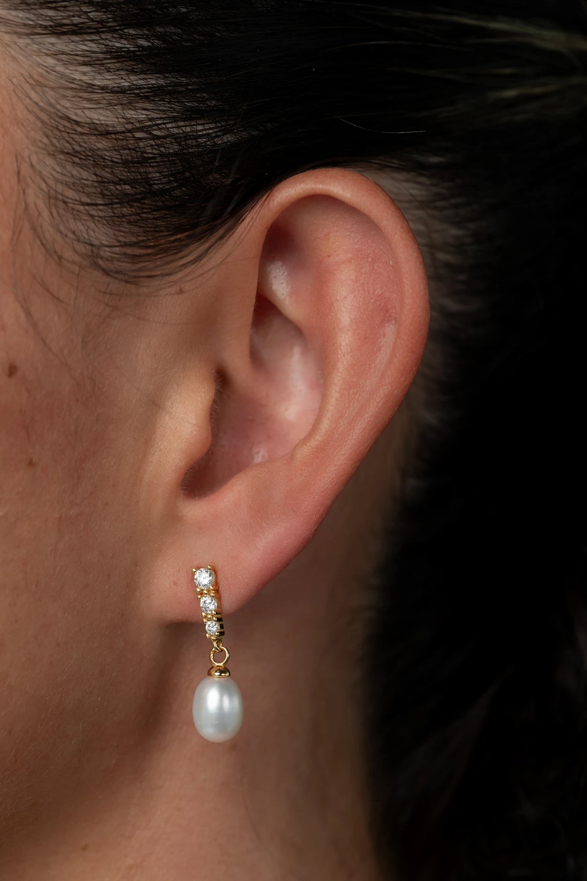 Romona Freshwater Pearl Earrings with luminous pearls and gold-finished sterling silver settings.