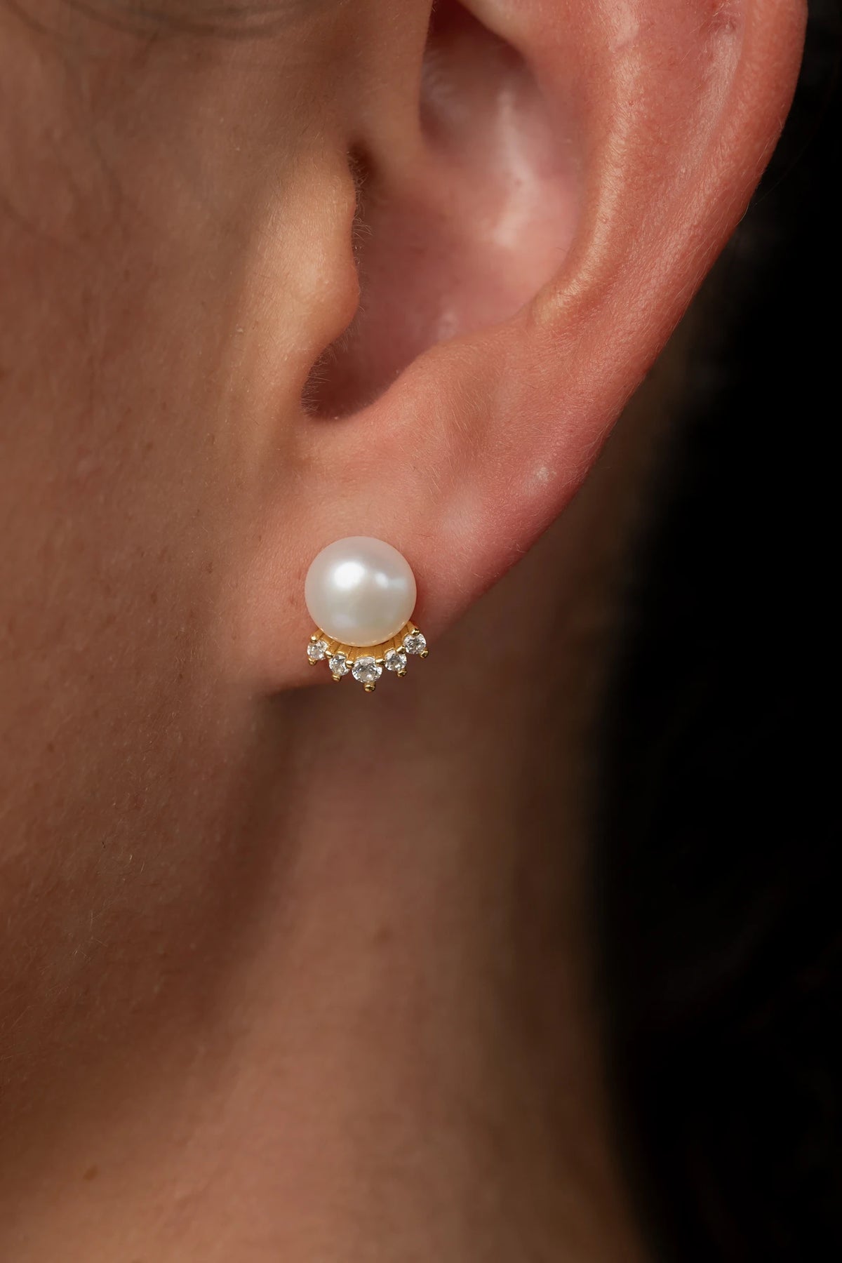 Livvy Gold-Plated Pearl Stud Earrings with luminous pearl centers and polished gold-plated settings.