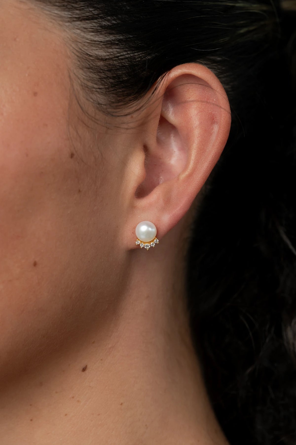 Livvy Gold-Plated Pearl Stud Earrings with luminous pearl centers and polished gold-plated settings.