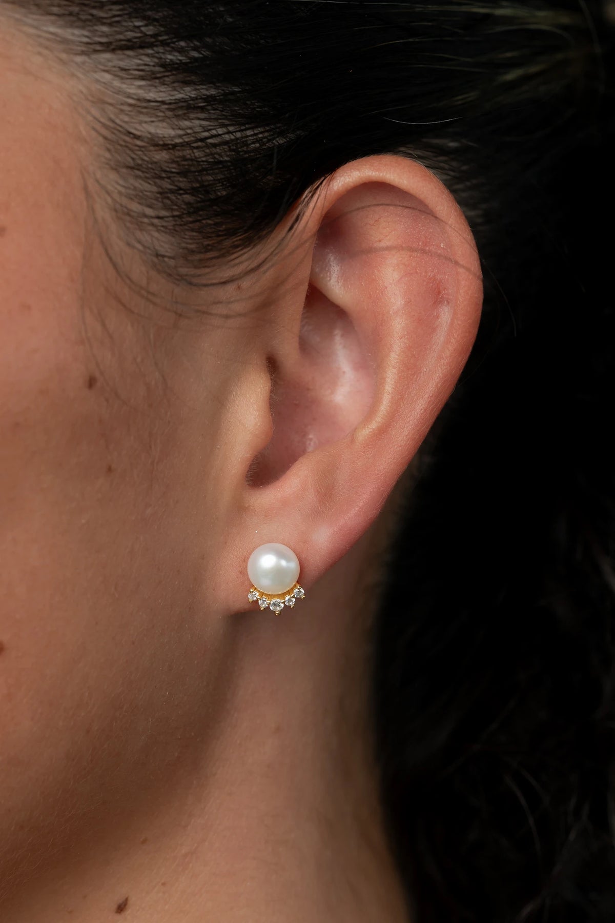 Livvy Gold-Plated Pearl Stud Earrings with luminous pearl centers and polished gold-plated settings.