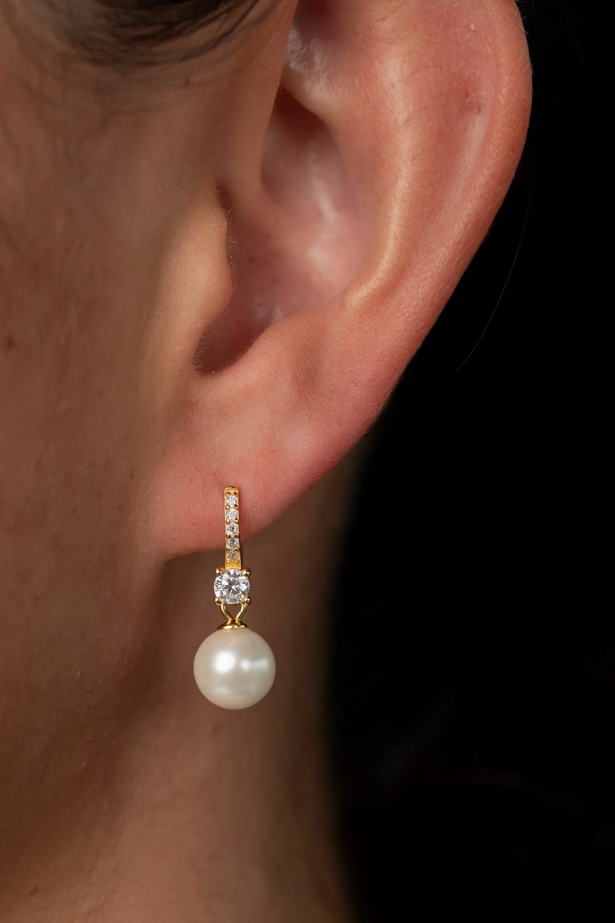 Isabella Pearl Hoop Earrings with lustrous pearl accents and a polished gold-plated finish.