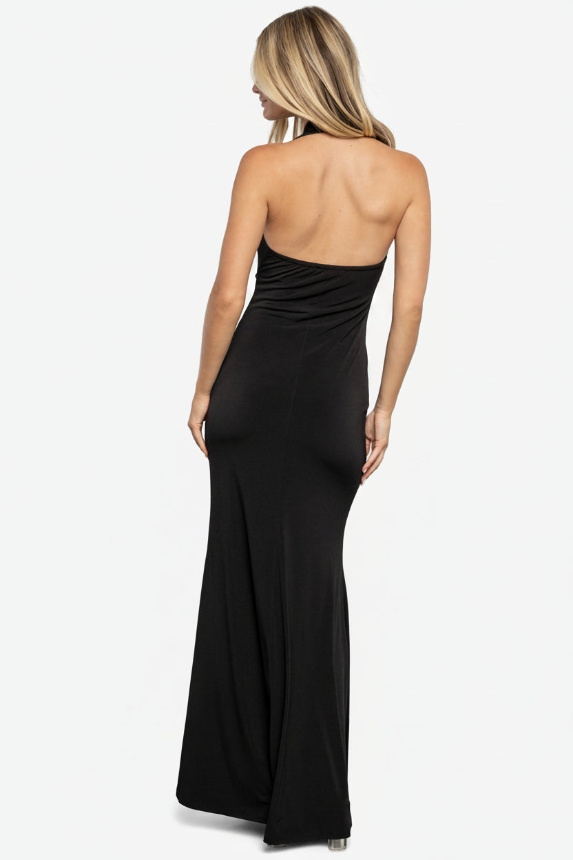 Back view of the gown displaying the open back with clear elastic and partial mesh lining, demonstrating support and modern design.