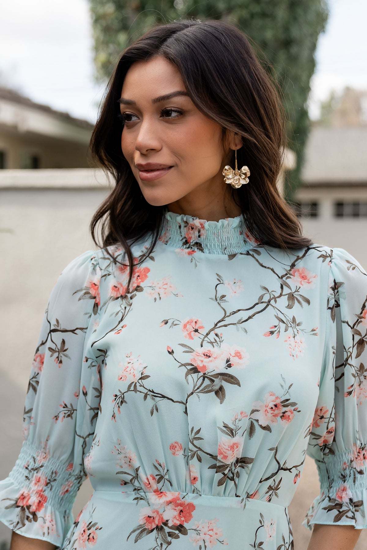 Close-up detail of Marie Mock Neck Maxi Dress fabric and stitching, showing chiffon texture, smocked neckline and pleated waist detail.