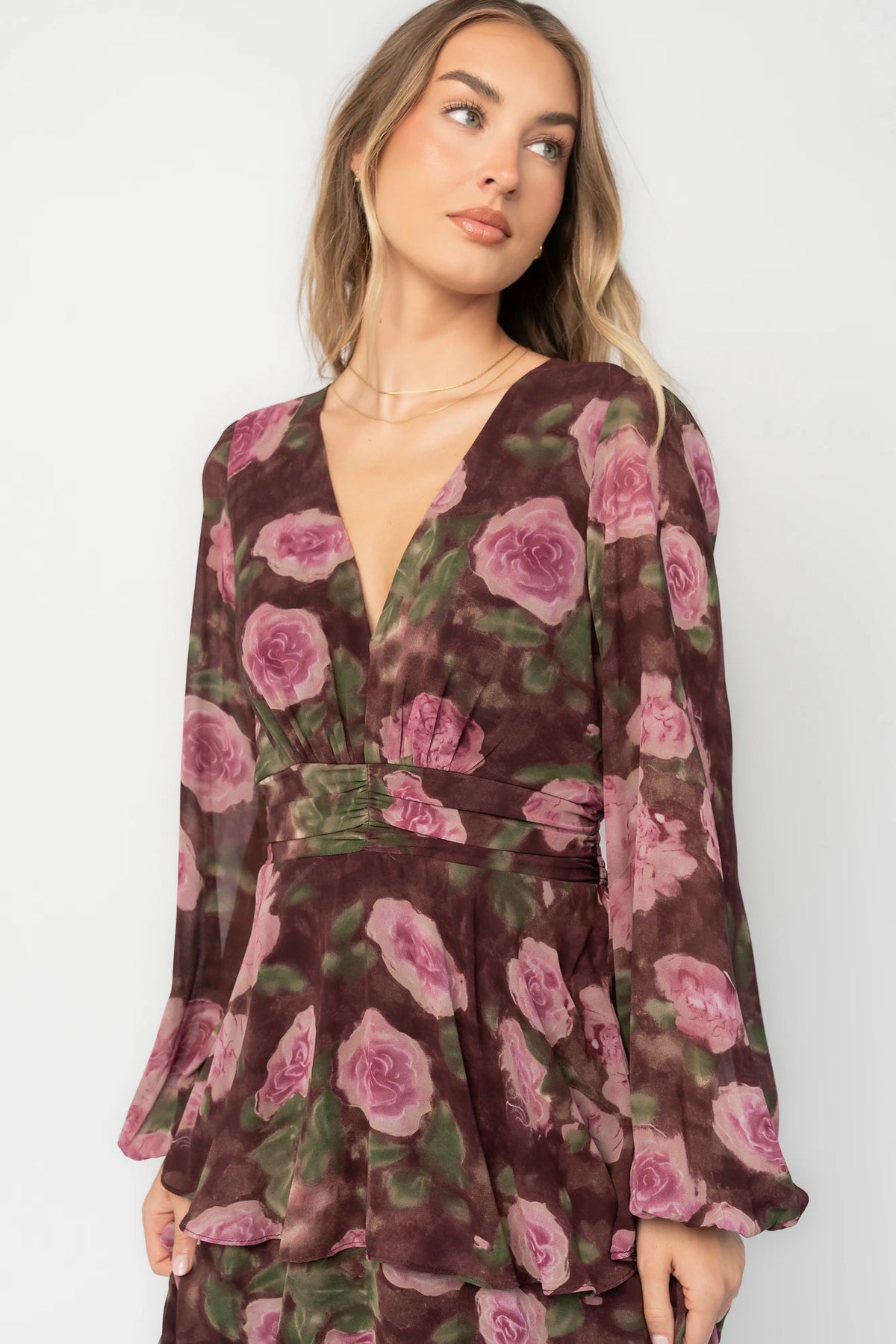 Mariella Tiered Maxi Dress in Deep Plum Floral with V-neckline, long puff sleeves, smocked back, and cascading ruffles.