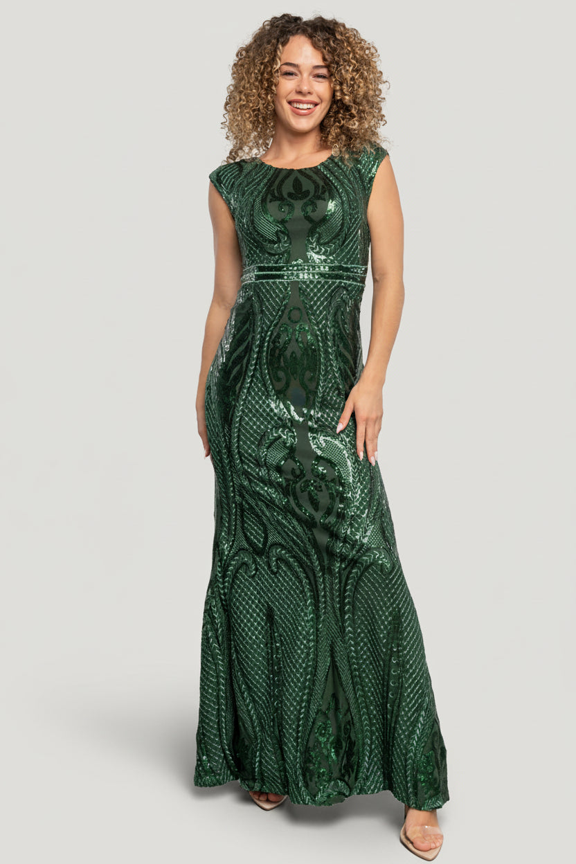 Studio view of Alessia gown laid to show embroidered sequin pattern across the skirt and the gown's floor-length mermaid cut.