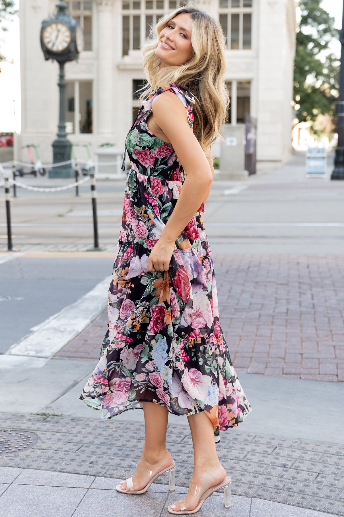 Back view of the Anita Maxi Dress focusing on the smocked back panel, self-tie straps, and soft drape of the chiffon tiers.