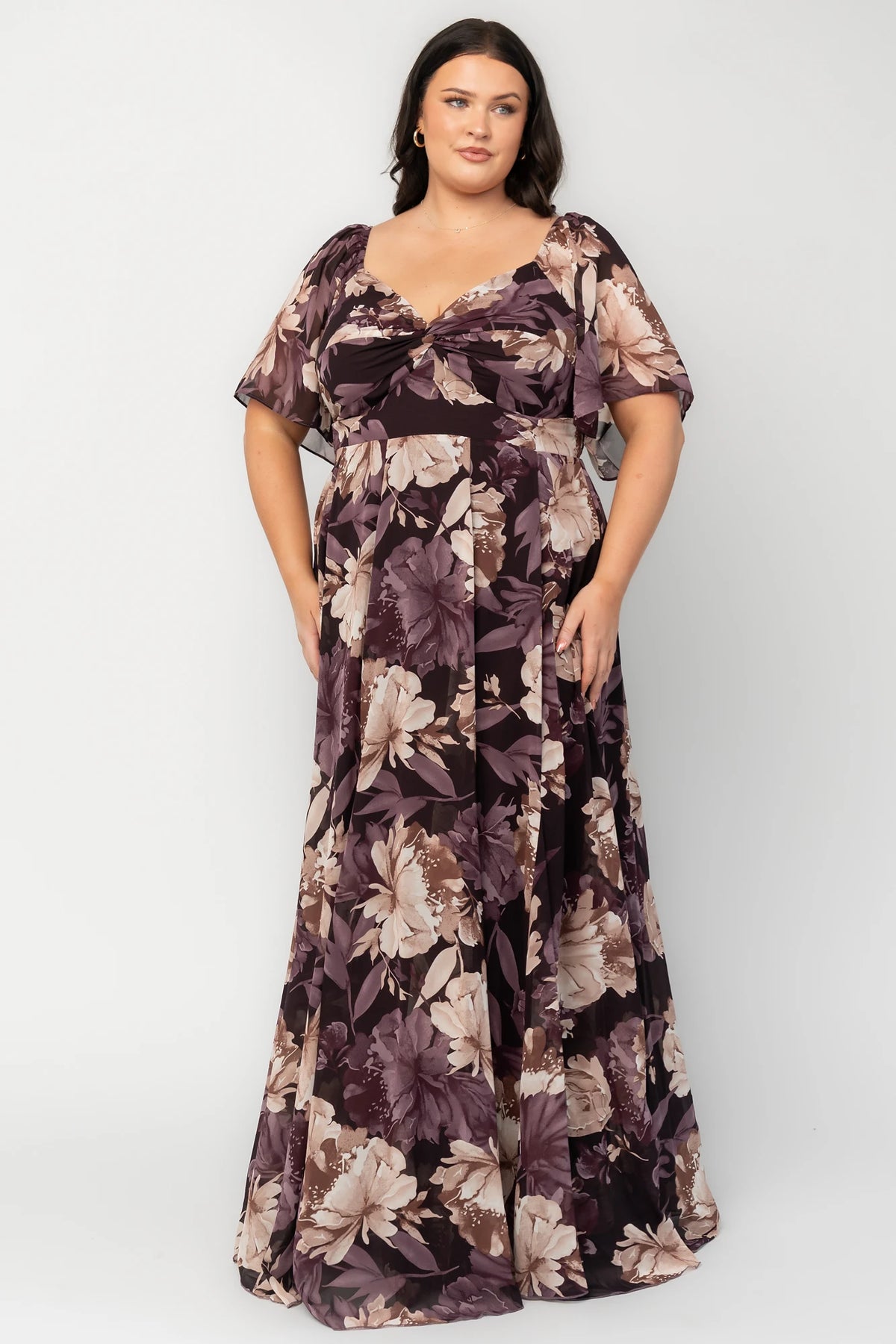 Positano Maxi Dress in Dusty Plum Floral with sweetheart neckline, flutter sleeves, smocked back, and tiered skirt.
