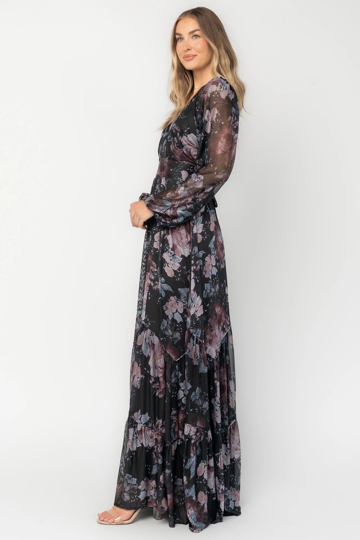 Rhiannon Maxi Dress in Midnight Floral with surplice V-neck, self-tie waist, sheer sleeves, and tiered mesh skirt.
