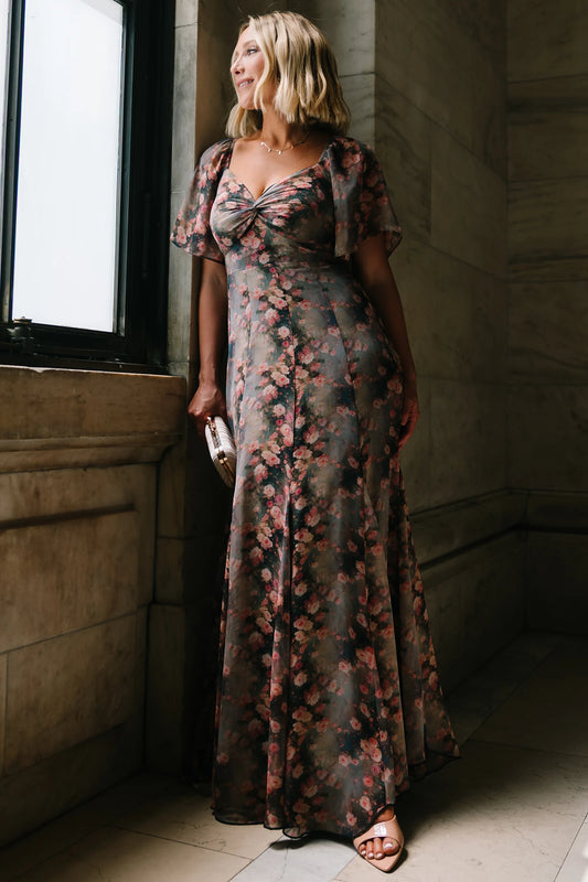 Positano Maxi Dress in Multi Floral with sweetheart neckline, flutter sleeves, smocked back, and flowy tiered skirt.