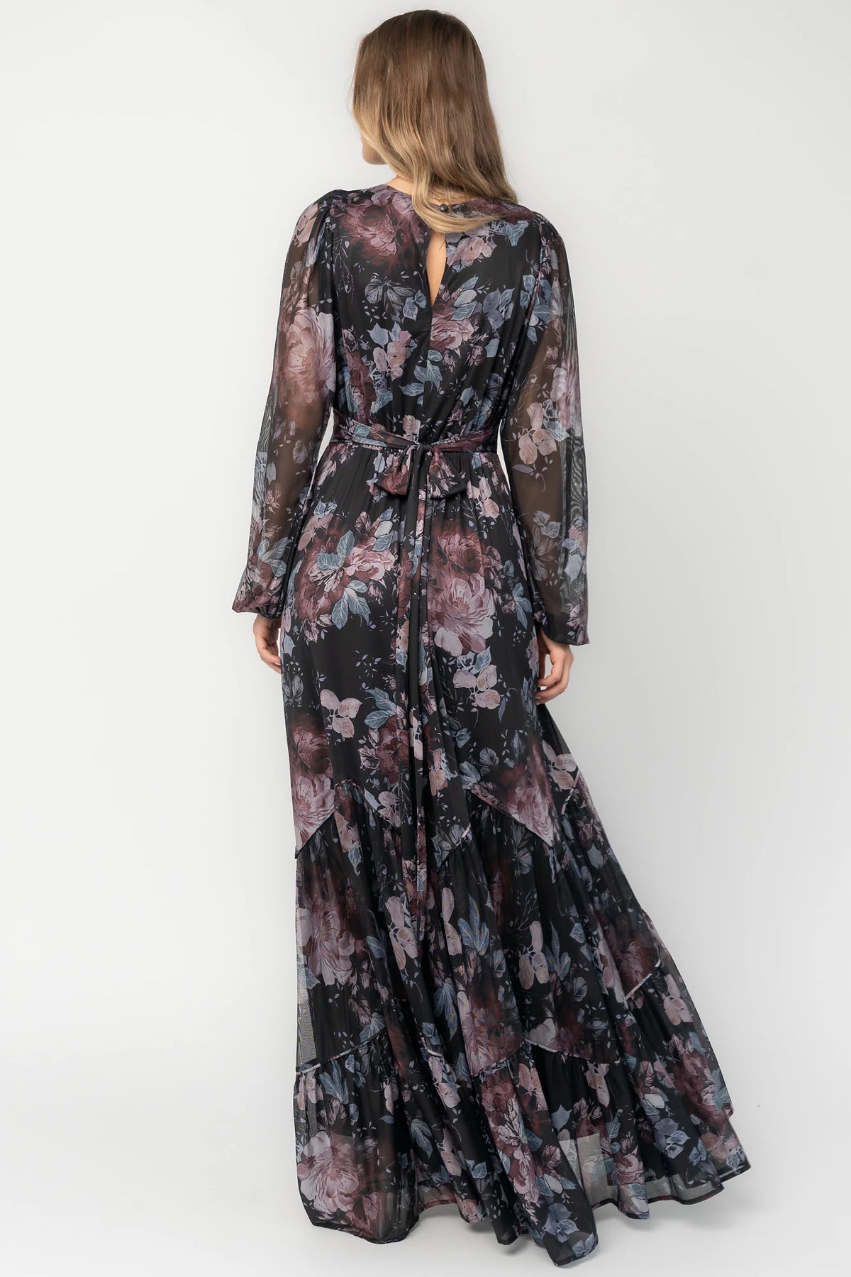Rhiannon Maxi Dress in Midnight Floral with surplice V-neck, self-tie waist, sheer sleeves, and tiered mesh skirt.