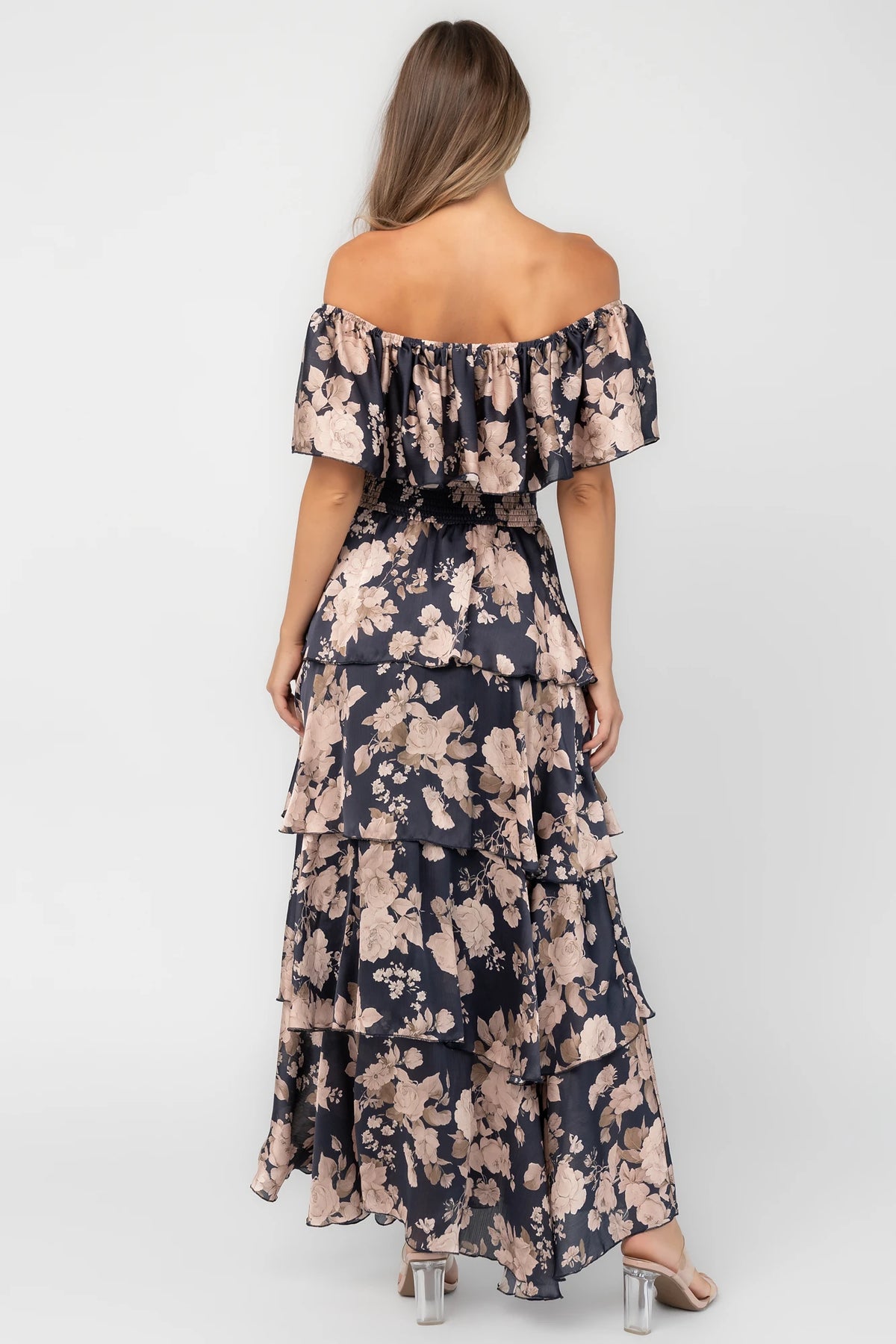 Isabelle Off Shoulder Maxi Dress in Multi Floral with elastic neckline, ruffle bust, smocked waist, and four-tiered skirt.