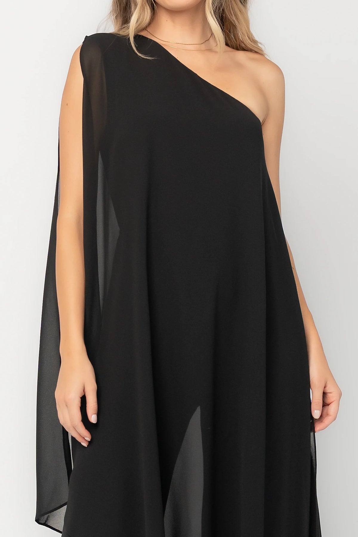 Penthouse One-Shoulder Jumpsuit in Black with asymmetric neckline, draped overlays, and flowing wide-leg silhouette.