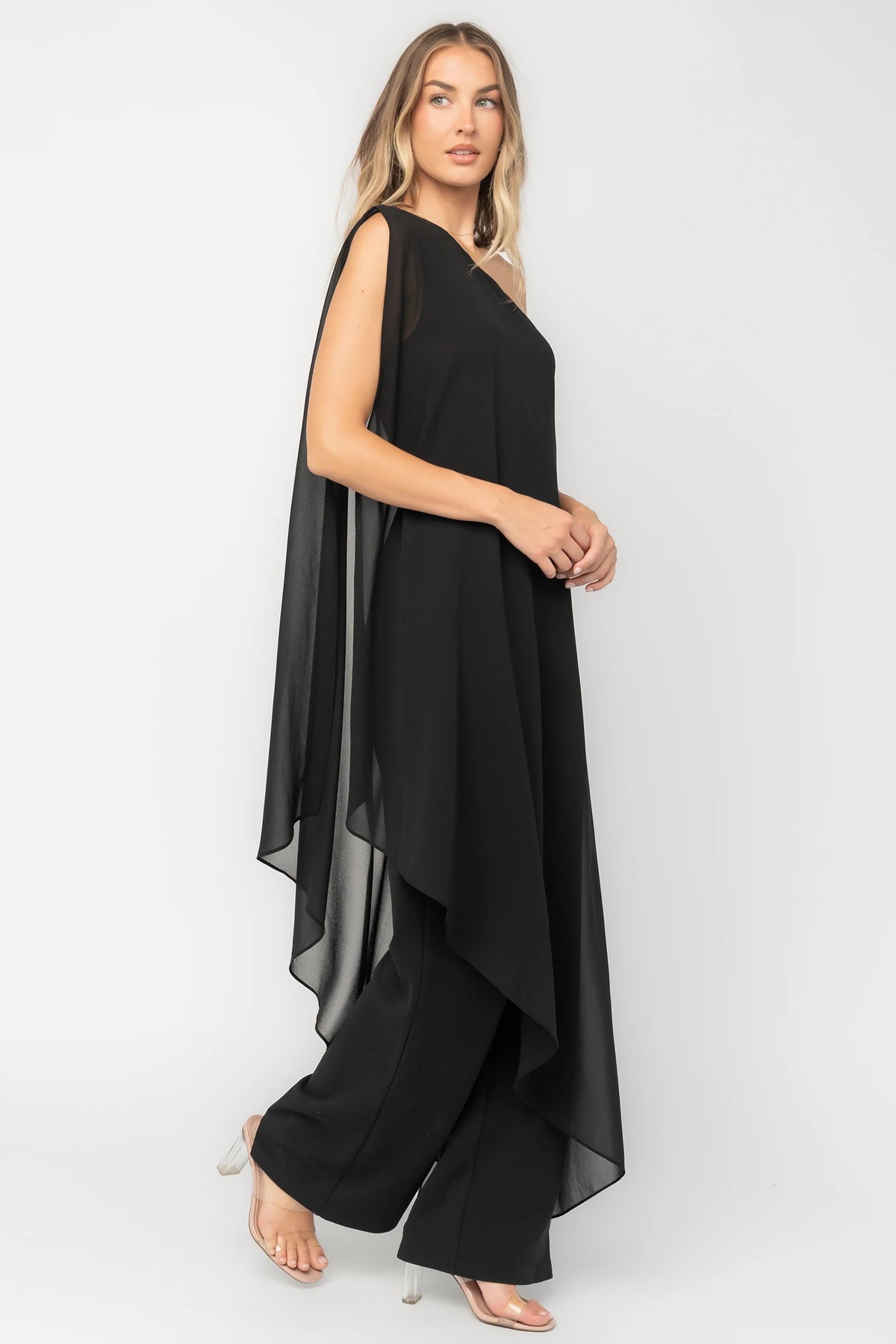 Penthouse One-Shoulder Jumpsuit in Black with asymmetric neckline, draped overlays, and flowing wide-leg silhouette.