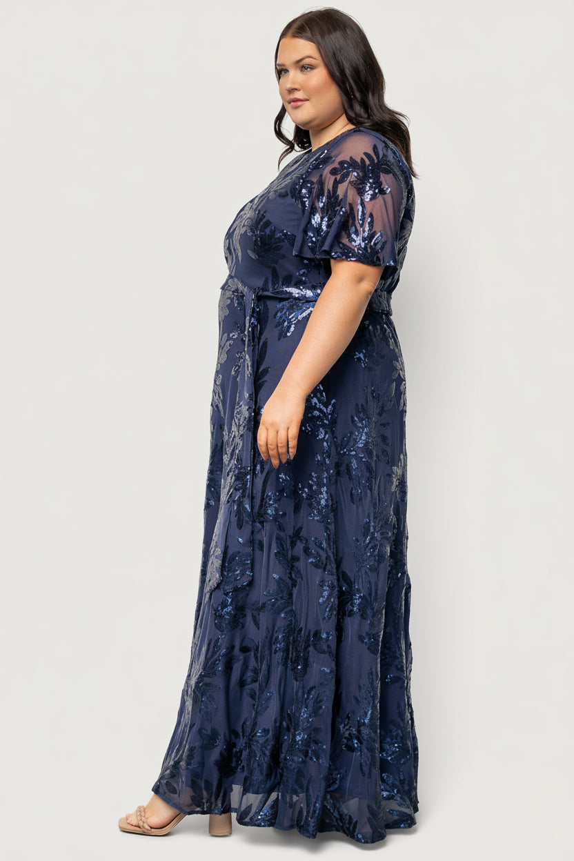 Model full-length shot wearing Muse Sequin Maxi Dress in navy to show floor-skimming maxi length, fit, and overall silhouette on a real wearer.