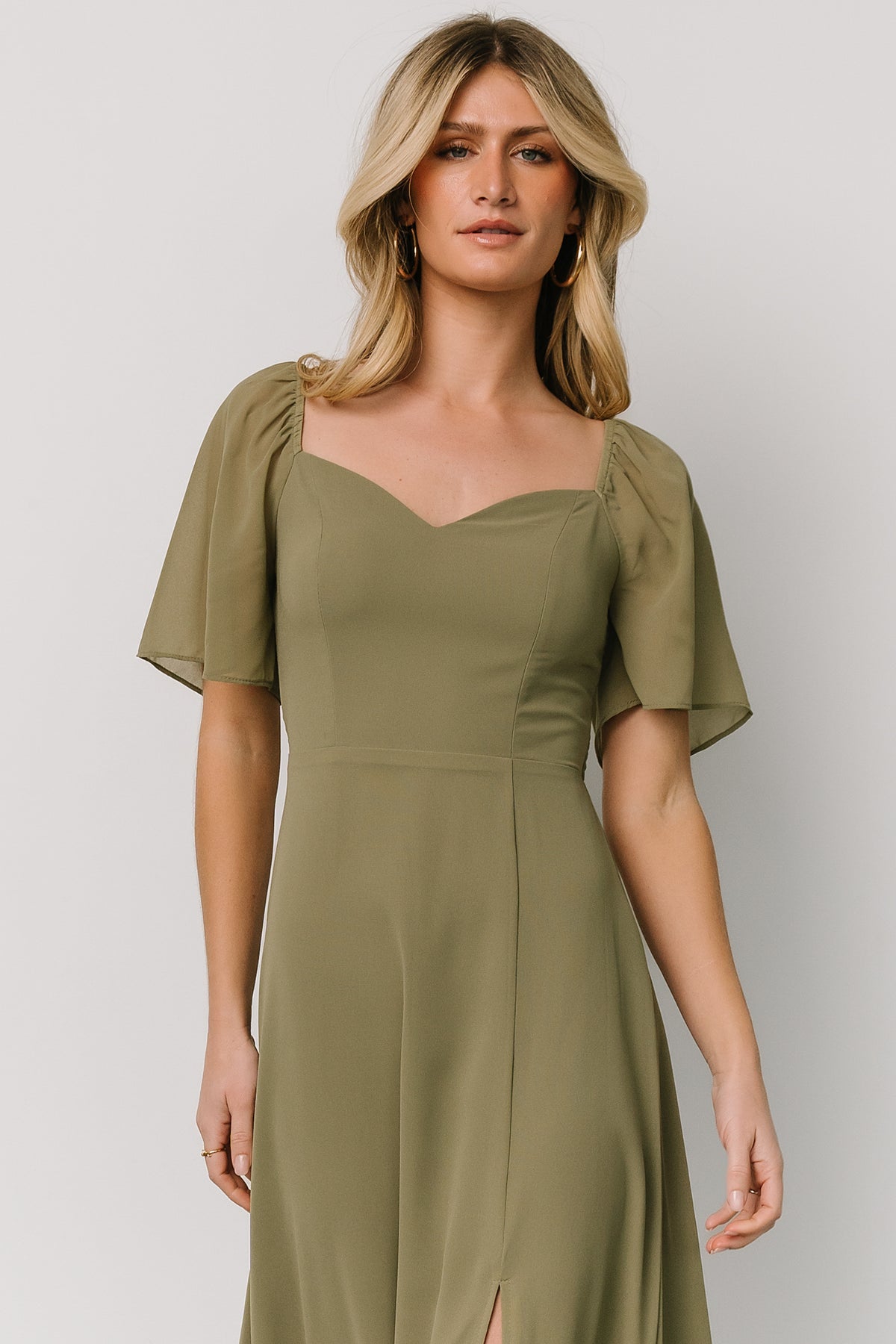 Sierra Chiffon Dusty Olive swatch held flat to display color depth, translucency, and the chiffon’s delicate, flowing hand for accurate comparison.