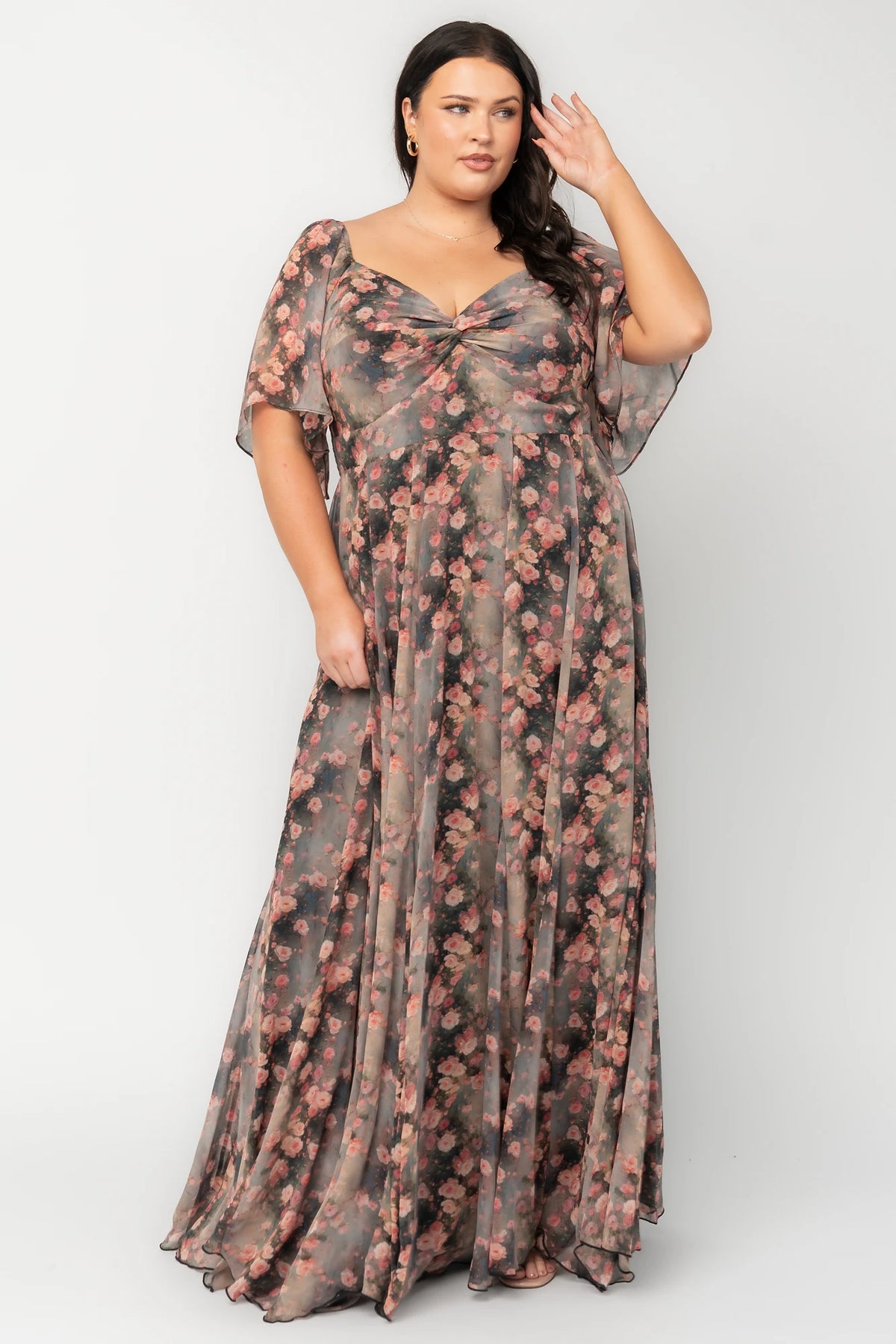 Positano Maxi Dress in Multi Floral with sweetheart neckline, flutter sleeves, smocked back, and flowy tiered skirt.