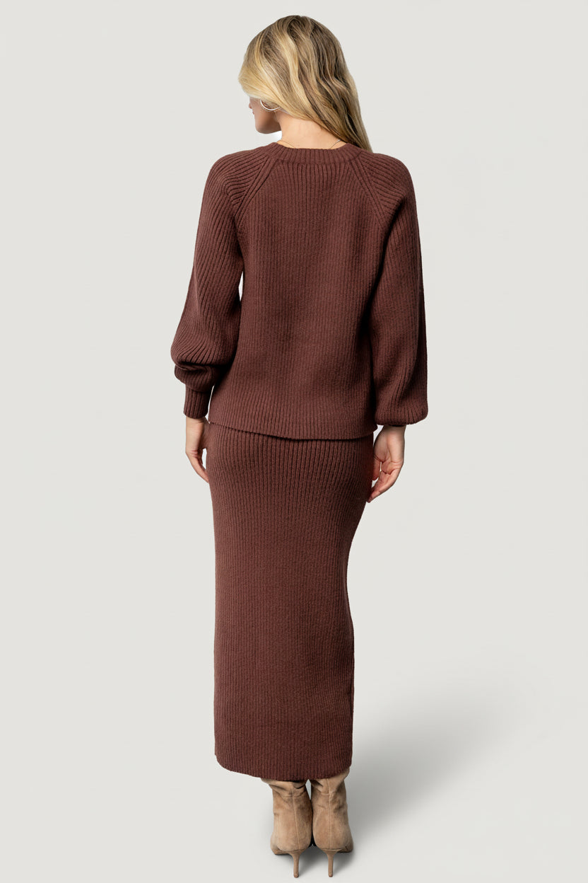 Styled outfit image showing the Mahogany Blair cardigan paired with coordinating pieces, emphasizing color pairing and versatile styling options.