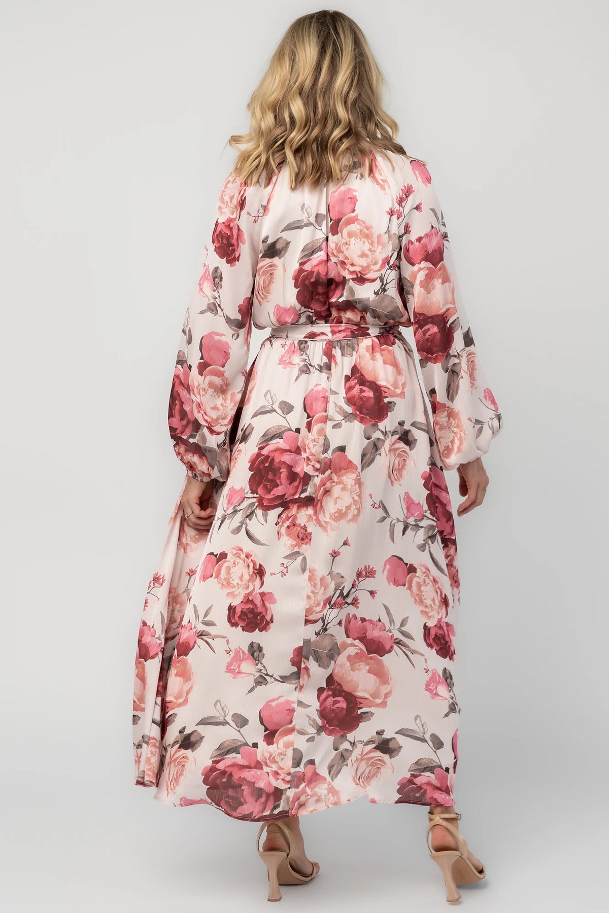 Rose floral maxi dress with a split V-neckline, ruffle-trimmed collar, long balloon sleeves, removable self-tie belt, and a flowing maxi skirt.