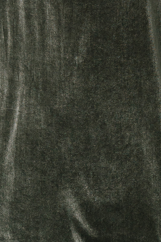 Close-up of Tatiana Velvet fabric swatch in Eucalyptus showing velvet pile, subtle sheen, texture and slight stretch on a white background.
