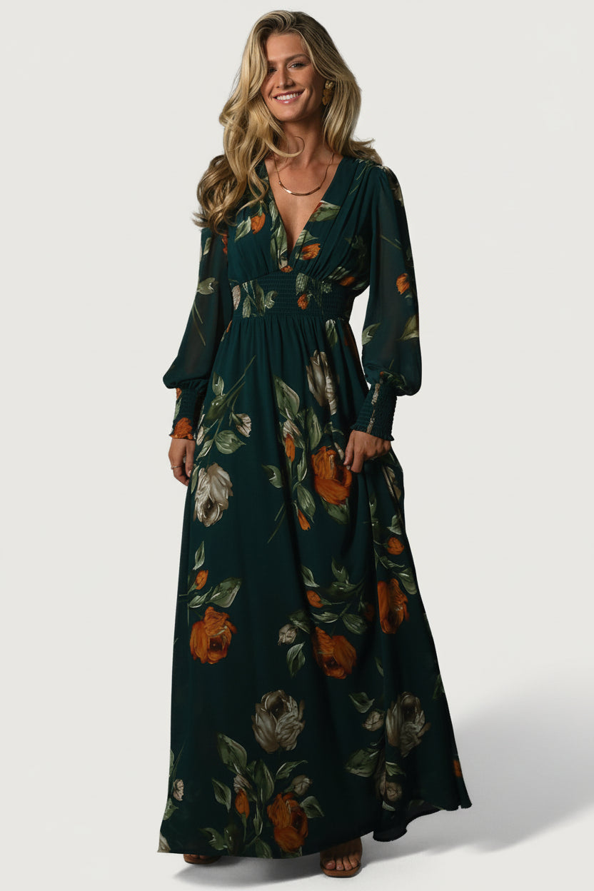 Front view of model wearing Olivia Maxi Dress in deep topaz floral chiffon with smocked waist and flowing maxi hem, long sleeves.