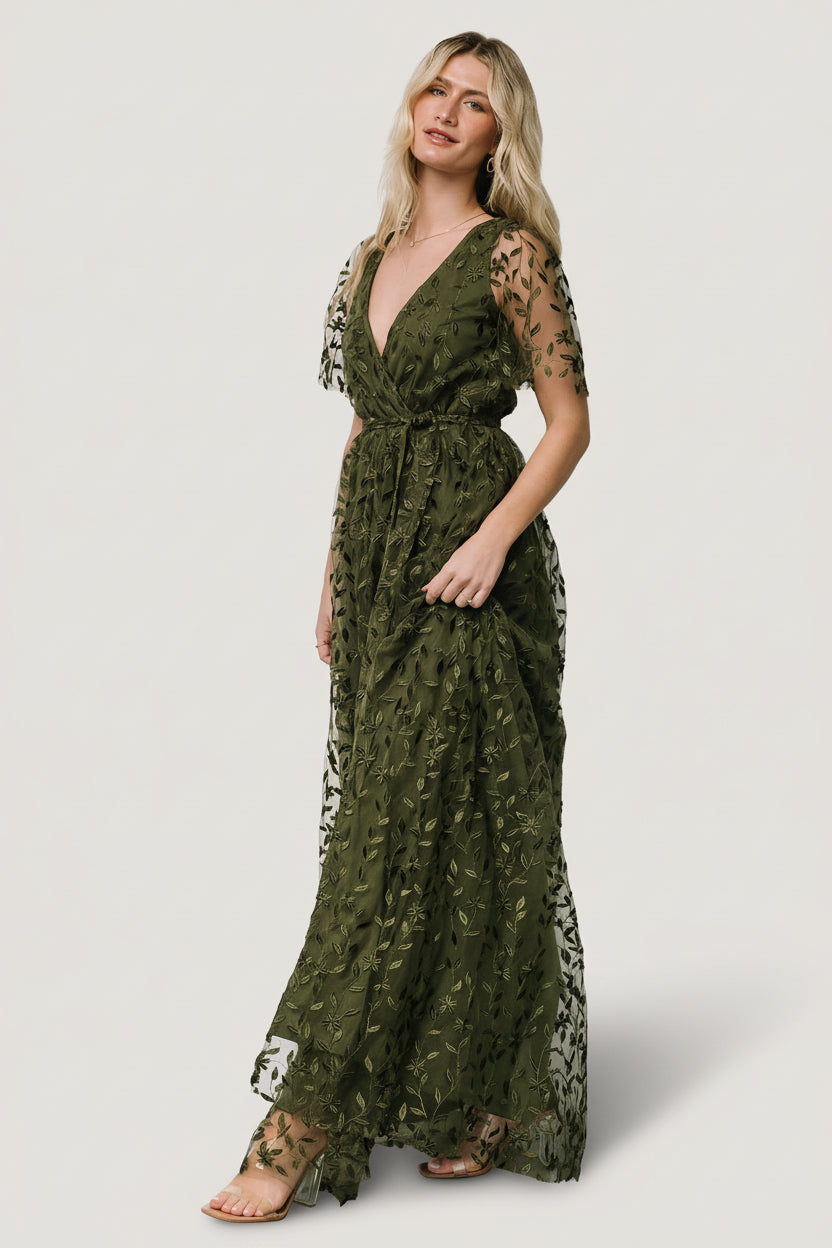 Close-up of vine-embossed organza fabric in olive, showing raised floral texture and structured finish without stretch for an elevated look.