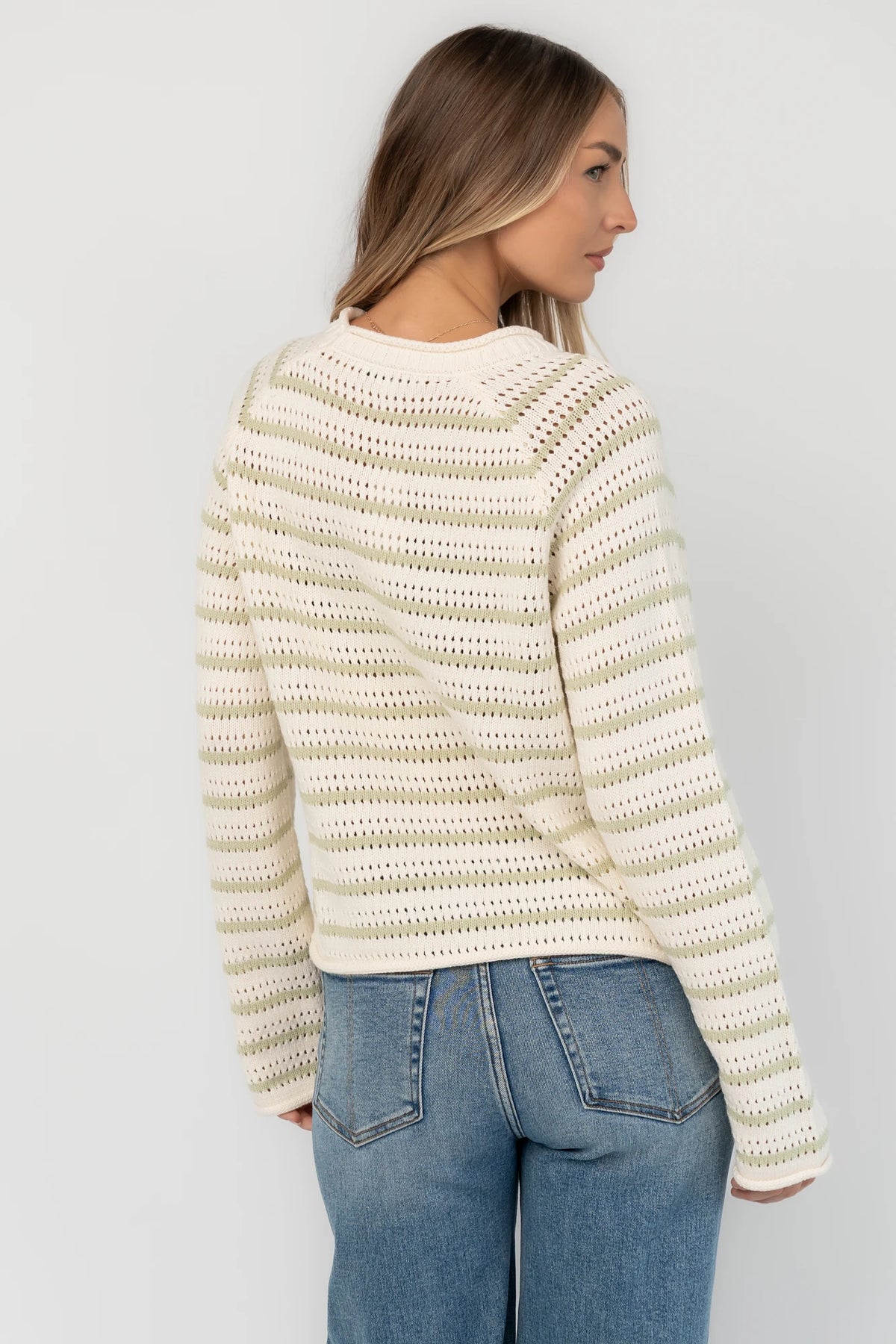 Cream and sage striped open-knit sweater with a round neckline, long sleeves, rolled trim, and a relaxed fit.