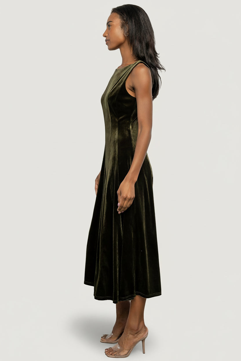 Close-up of Olive velvet fabric showing subtle sheen, soft pile, and stretch content (93% polyester, 7% spandex) for movement.