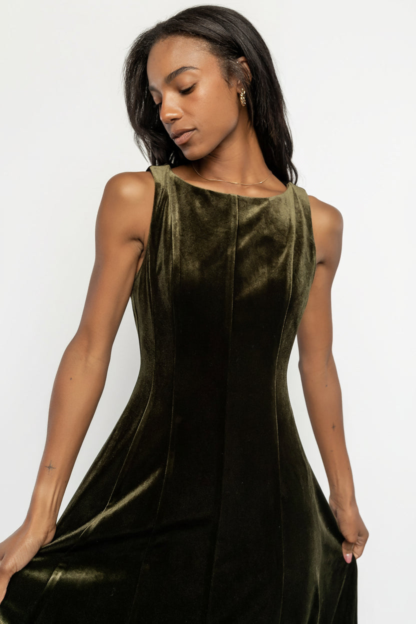 Back view of Annika Olive velvet midi dress showing center back zipper, seam detailing, and the unlined lightweight drape.