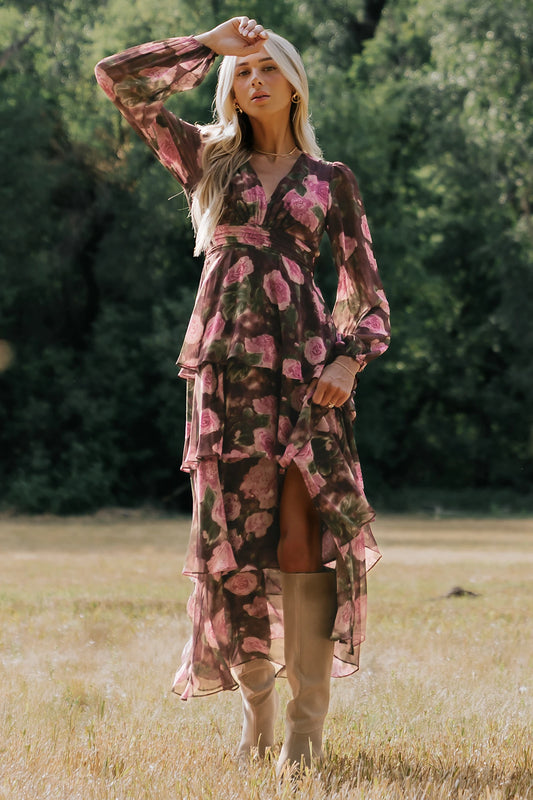 Mariella Tiered Maxi Dress in Deep Plum Floral with V-neckline, long puff sleeves, smocked back, and cascading ruffles.