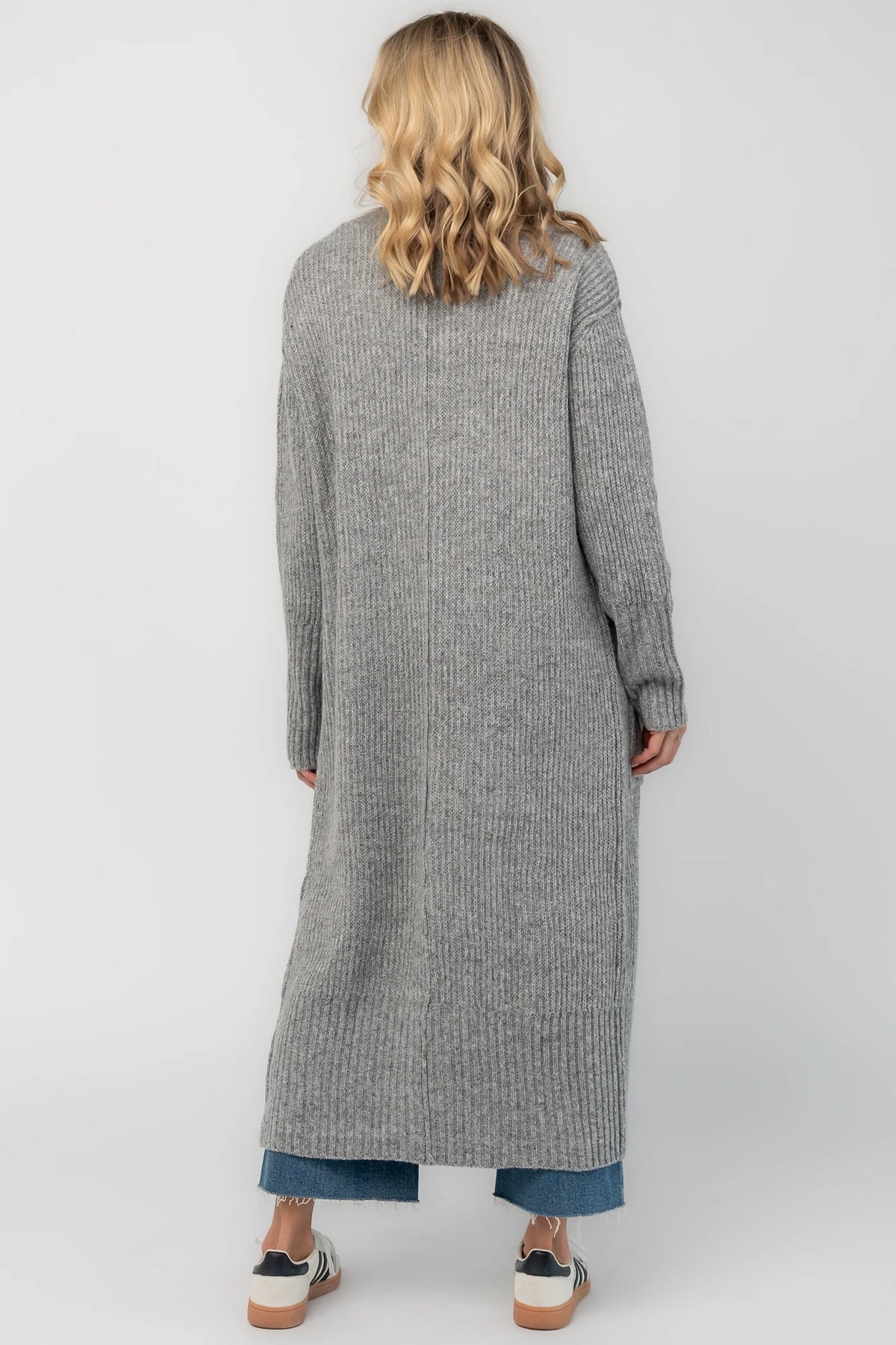 Heather gray ribbed long cardigan with an open front, long sleeves, front patch pockets, and a relaxed full-length silhouette.