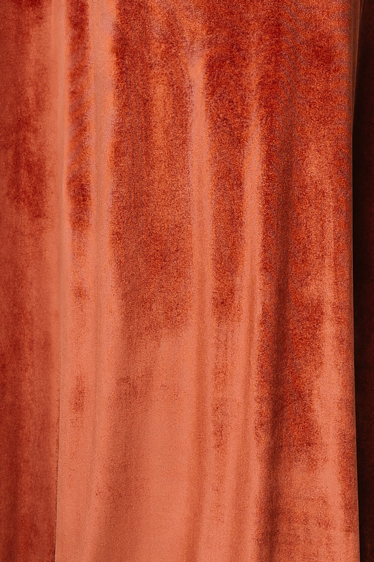 Close-up of Cinnamon Tatiana Velvet fabric swatch showing pile texture, subtle sheen, and stretch; approx. 3 by 4 inches.
