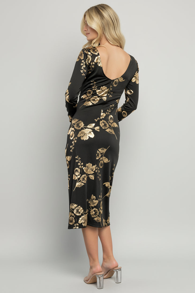 Three-quarter view of Valeria Midi Dress in black with gold floral accents, fitted bodice, scoop back, and elegant evening silhouette.