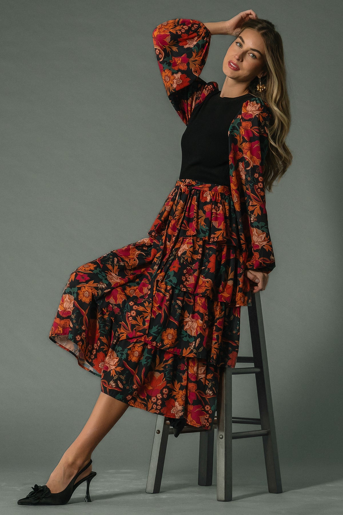 Back and side view of Sylvie Tiered Midi Dress showing tiered ruffle skirt, elastic waist and flowing chiffon panels.