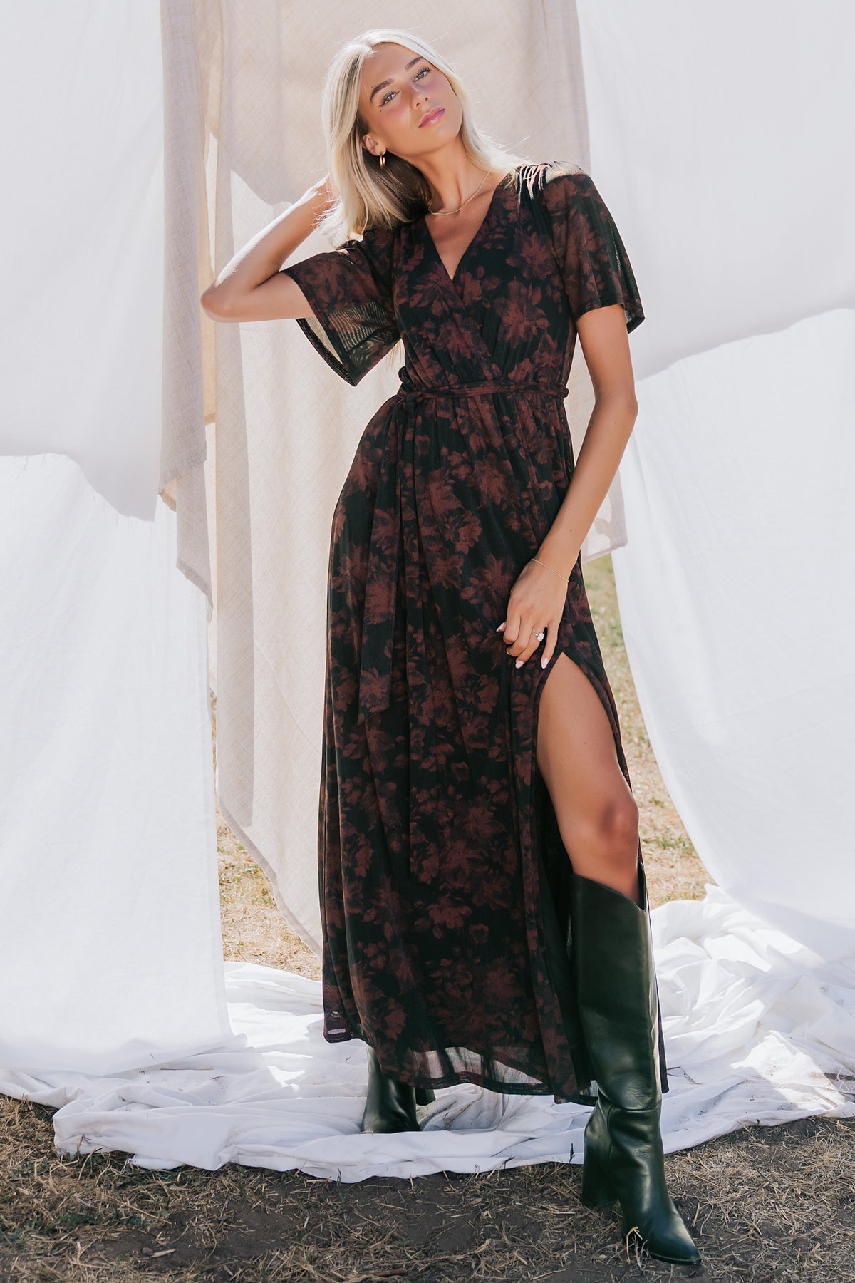 Reverie Maxi Dress in Black + Burgundy with floral print, surplice V-neck, sash waist, long sleeves, and side leg slit.