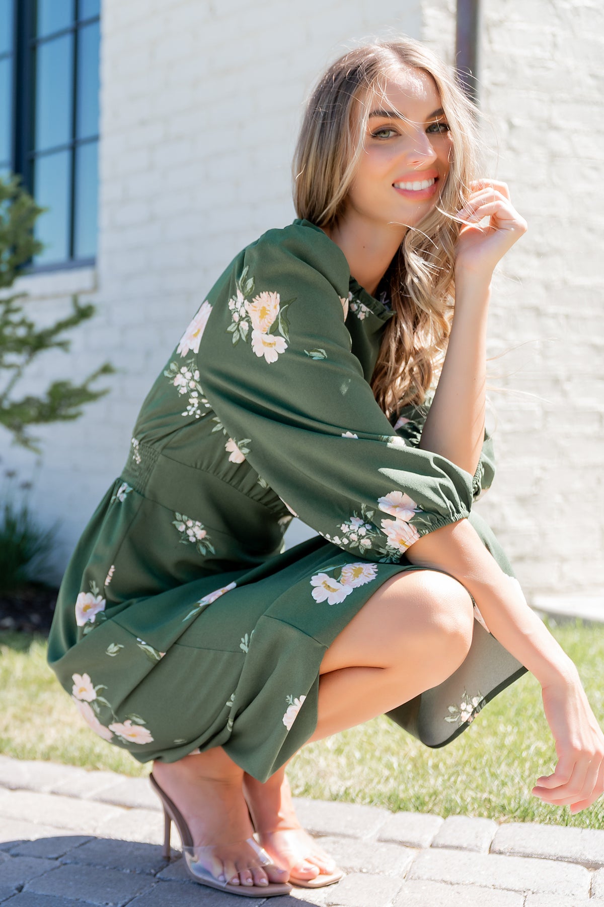 Side view of the Sugar Lips Karalie Maxi Dress showing mid-length sleeve with elastic cuff and the dress's flowing chiffon silhouette.