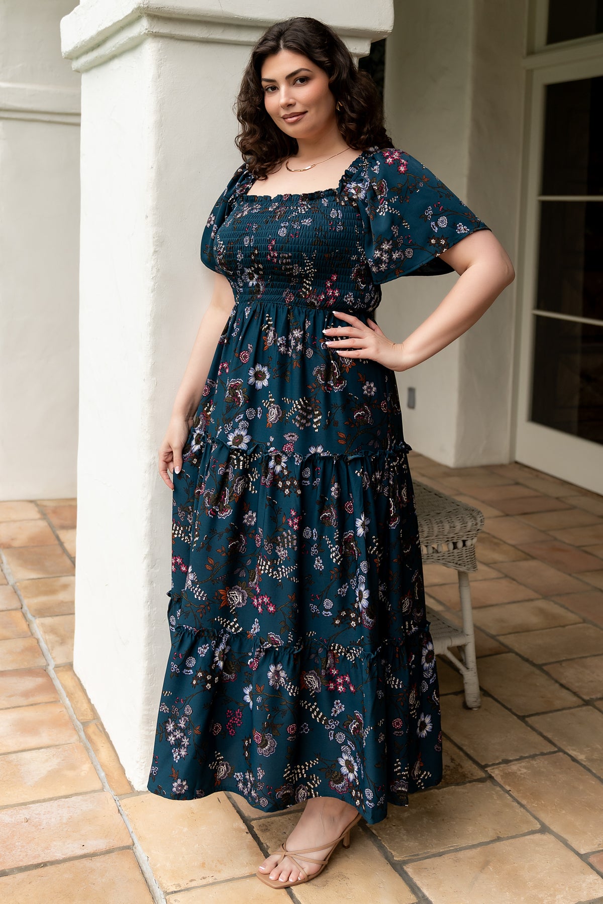 Front view of Southampton smocked maxi dress in jade blossom print showing square neckline, smocked bodice and tiered ruffle skirt on model.
