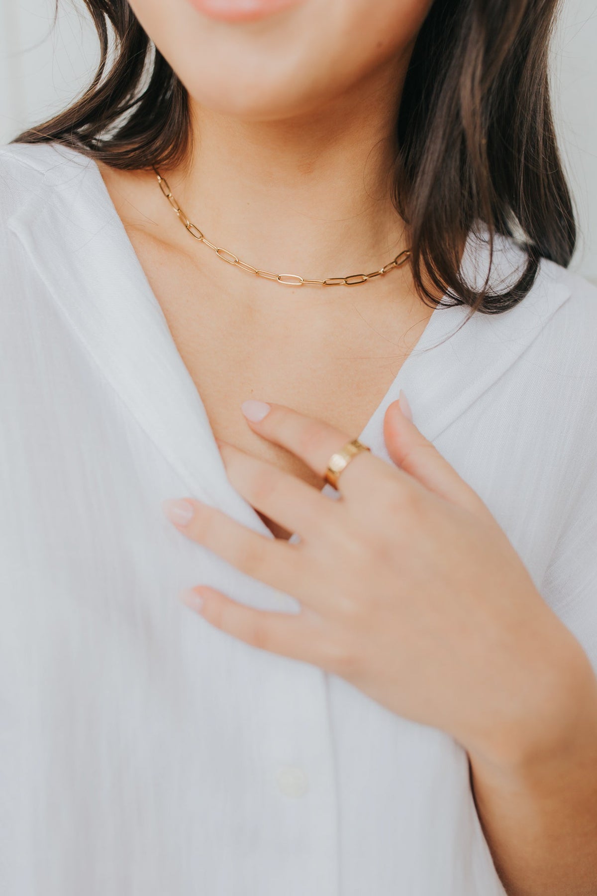 Detailed side view of The Eloise Necklace showing link profile and reflective 18K gold plating, illustrating the lightweight construction.