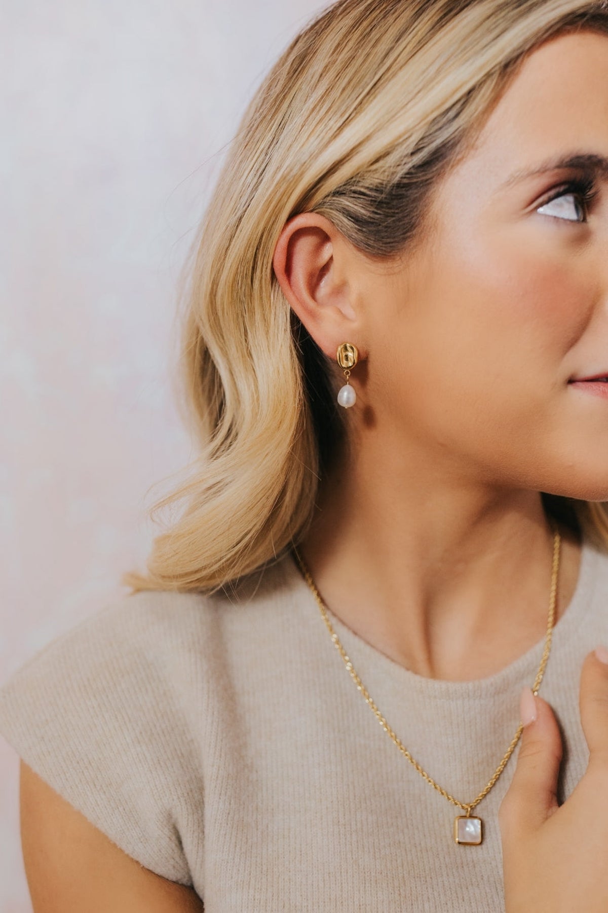 Pair of Ophelia Pearl Studs photographed side-by-side to show matching freshwater pearls and 18K gold-plated studs with subtle reflections.